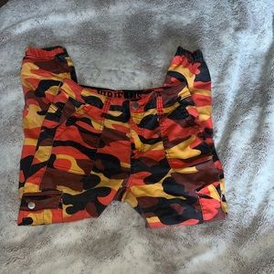 orange and black camouflage jeans